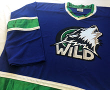 Load image into Gallery viewer, Custom hockey jerseys with the Wild team logo.