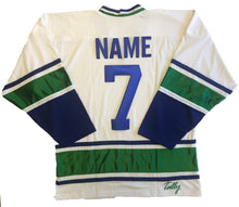 Load image into Gallery viewer, Custom hockey jerseys with the Wild team logo.