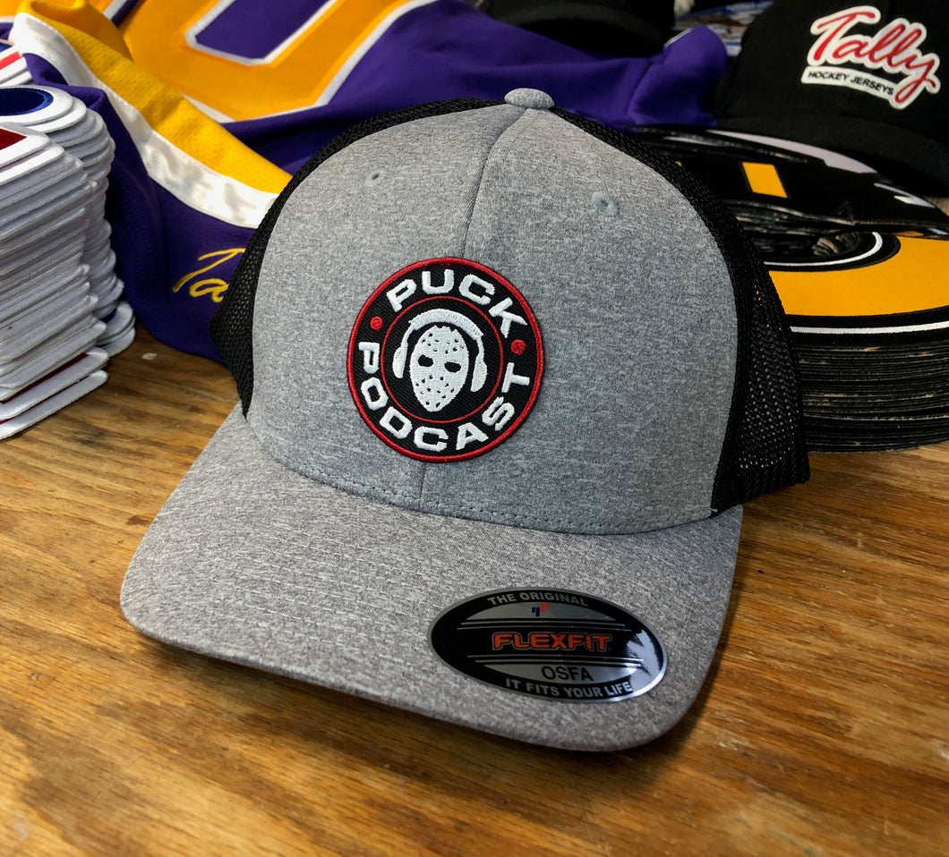 Flex-Fit Hat with the Puck Podcast embroidered twill crest $39 (Grey / Black)
