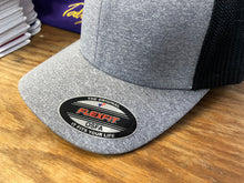 Load image into Gallery viewer, Flex-Fit Hat with the Jurassic Puck embroidered twill crest $39 (Grey / Black)
