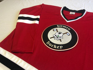 Custom hockey jerseys with Hitmen Hockey logo