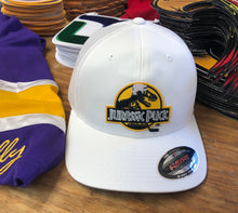 Load image into Gallery viewer, Flex-Fit Hat with a Jurassic Puck crest / logo $39 (White / White)
