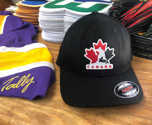 Load image into Gallery viewer, Flex-Fit Hat with a Team Canada crest / logo $39 (Black)
