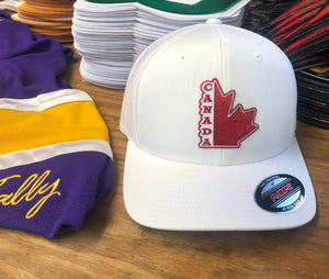 Flex-Fit Hat with a Team Canada embroidered twill logo $39 (White / White)
